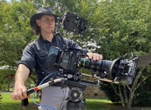Douglas Bischoff operating a Red Scarlet camera